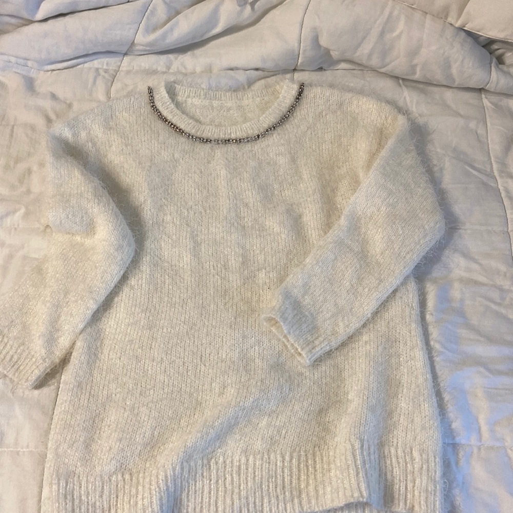 Cute simple oversized white fluffy sweater with detailed neckline